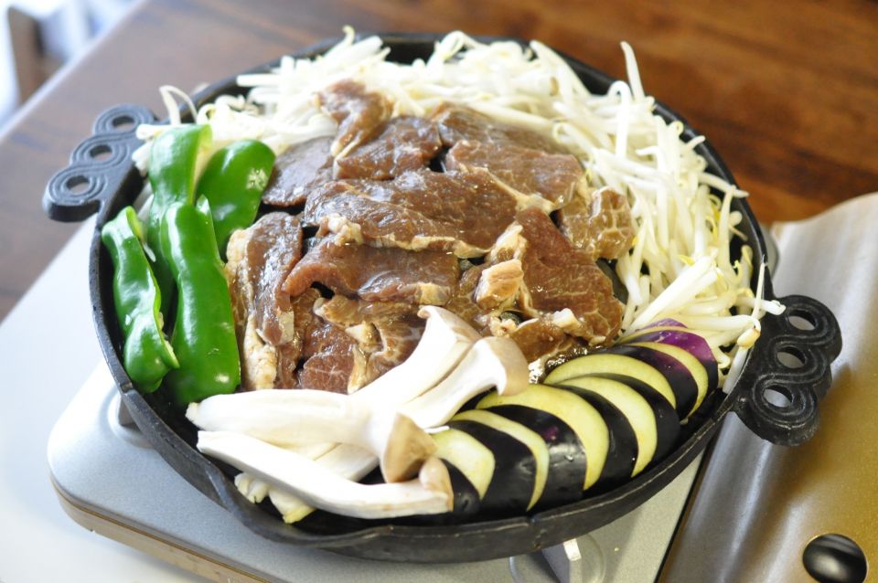 Grilled lamb and vegetables on a dome-shaped skillet (Jingisukan from Hokkaido)