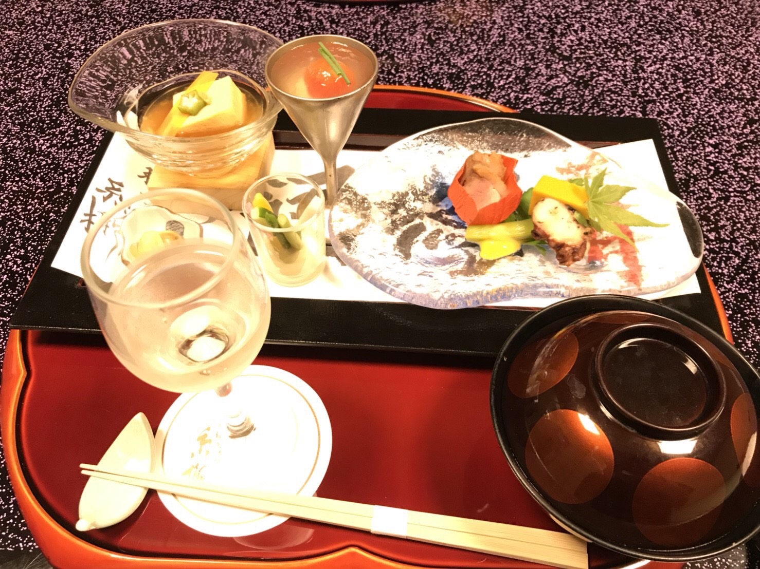Oshibori wet towel and neatly prepared Japanese meal setting