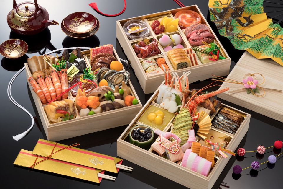 Traditional Japanese New Year cuisine osechi ryori in colorful boxes