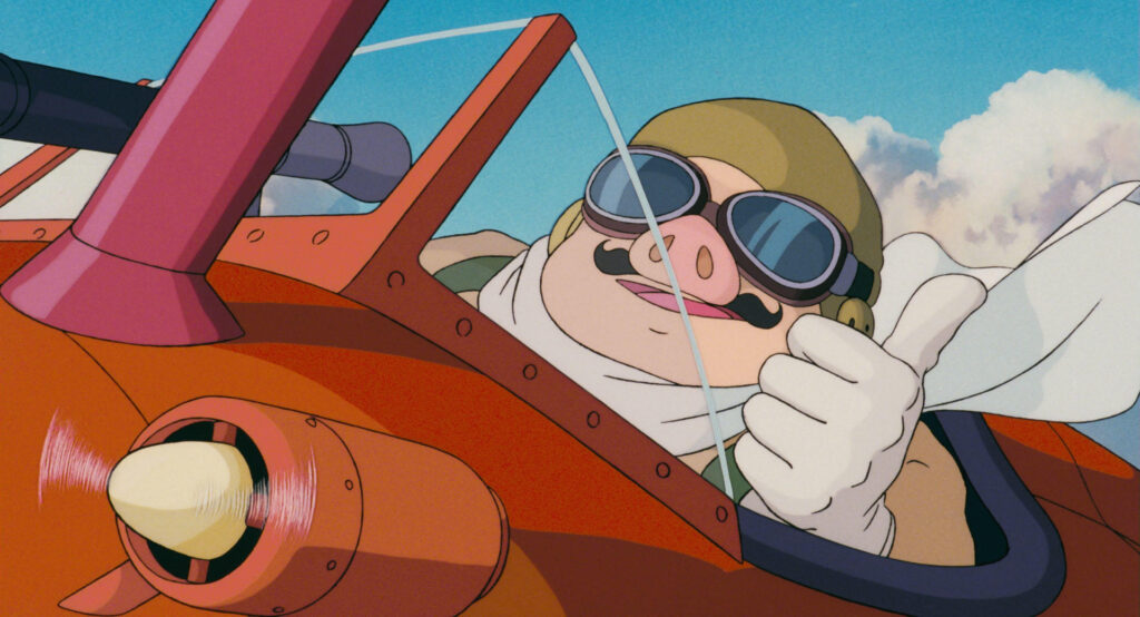 alt="Porco Rosso piloting a red airplane(紅の豚のポルコが赤い飛行機を操縦する)"