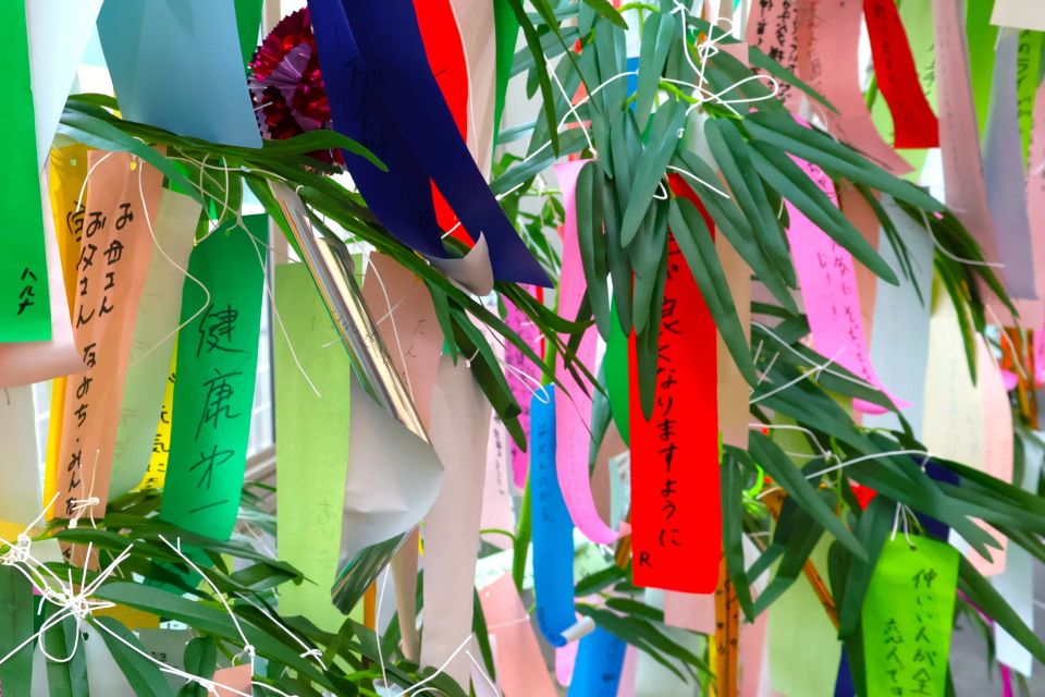 Colorful Tanzaku wishes hanging from bamboo branches during Tanabata in Japan