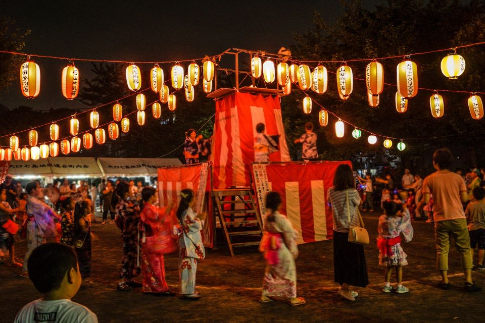 People dancing Bon Odori at a local summer festival