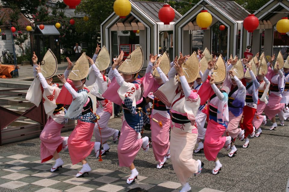 Awa Odori dancers performing in traditional costume