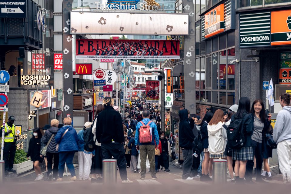 Colorful crowd walking through Takeshita Street in Harajuku